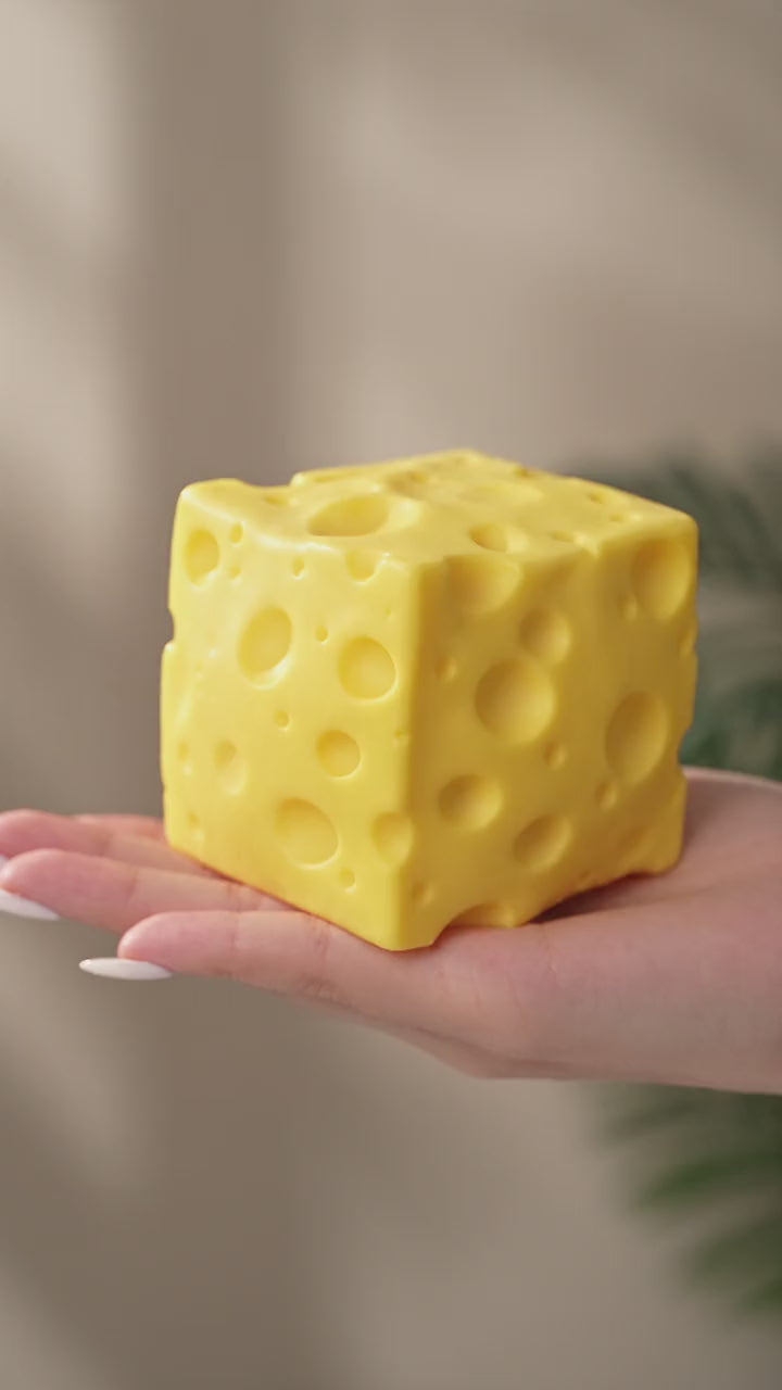 Close-up squish of the SquishJoy Cheese Block