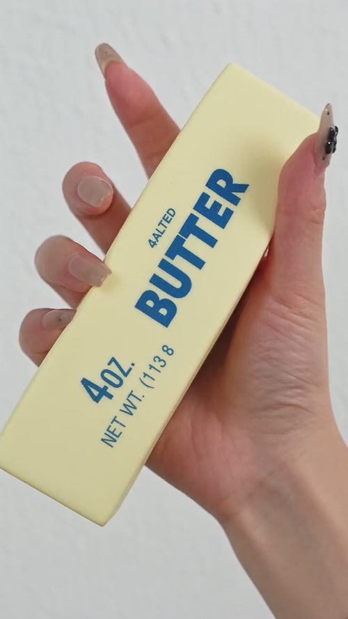 Squeezing the SquishJoy Butter Stick and watching it slowly rise